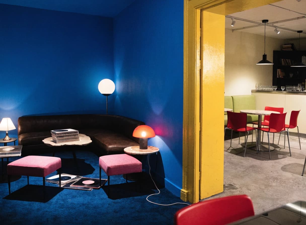 Cobalt listening room with records and lounge seating