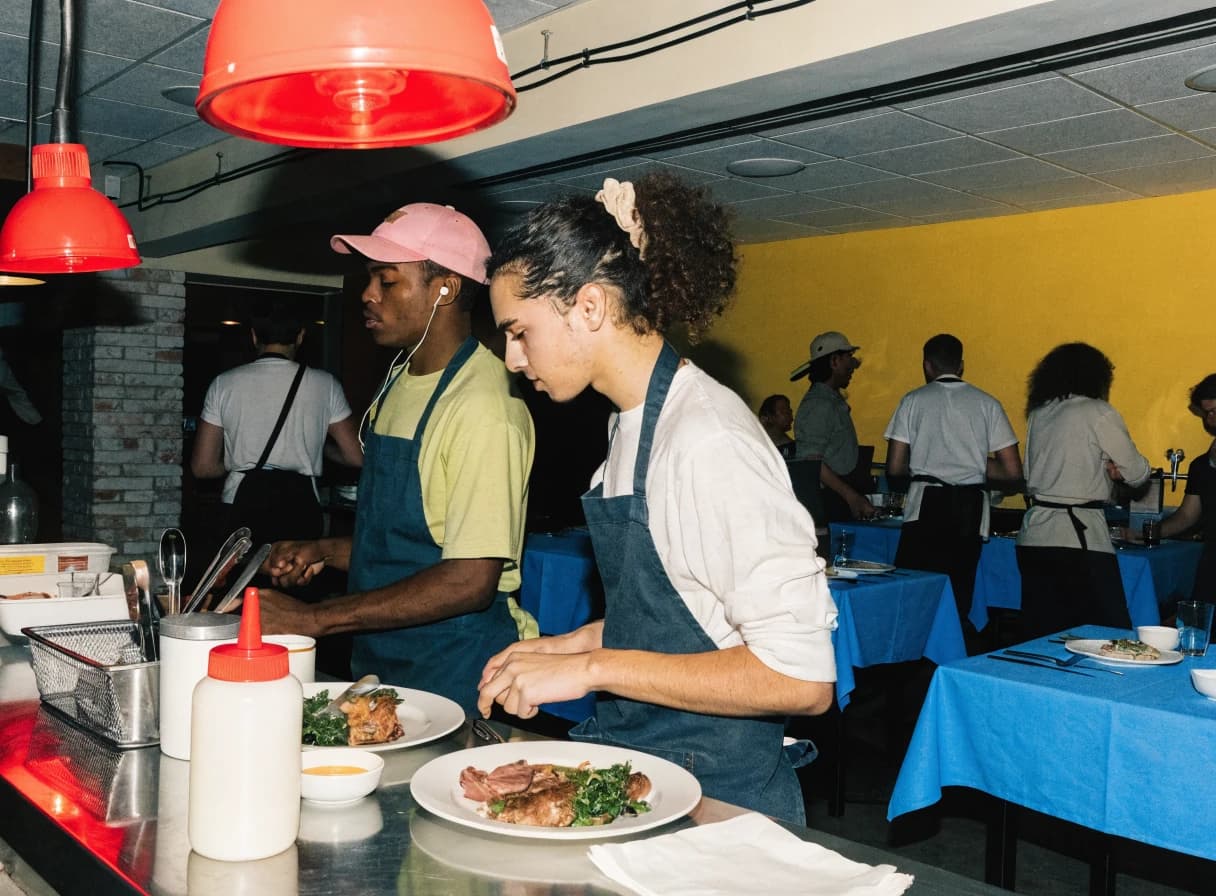 Open restaurant kitchen pass during service