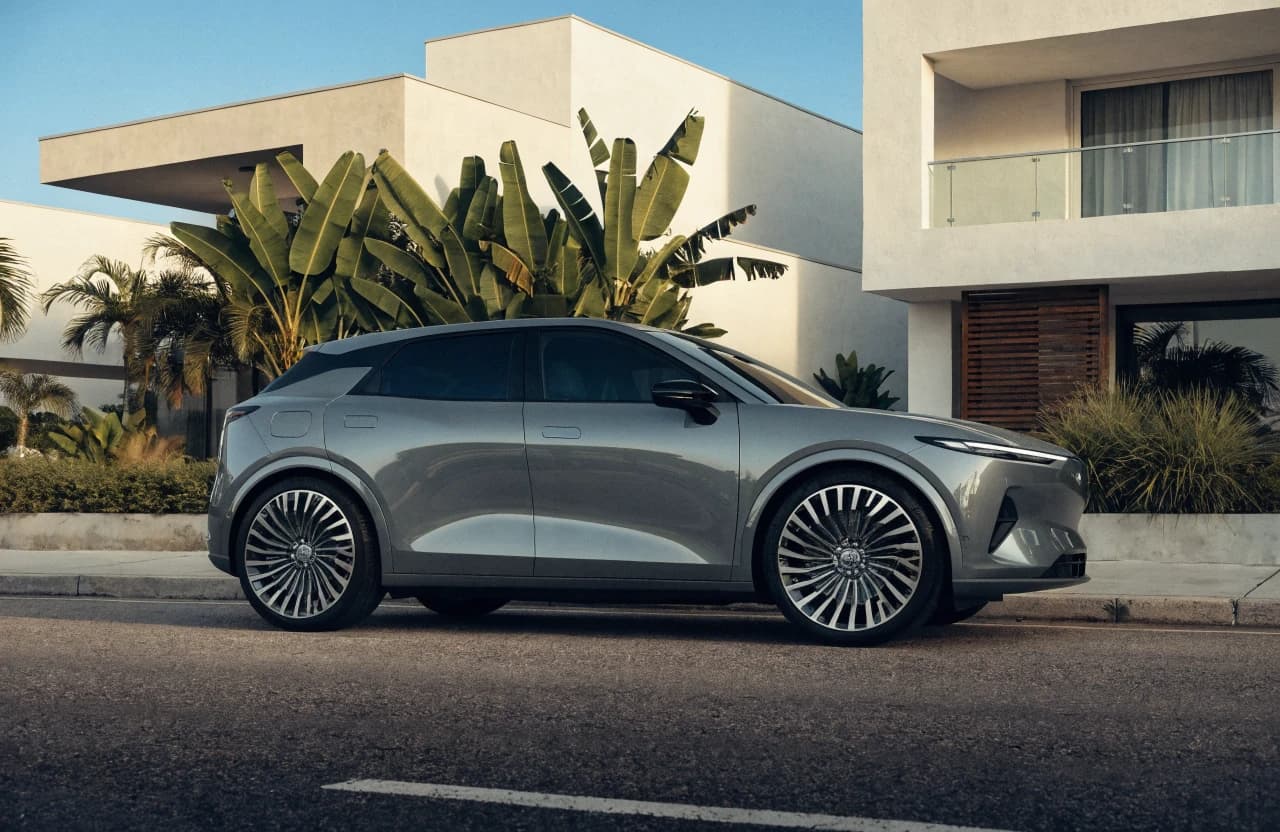 Silver compact SUV in a fictional dealership photo