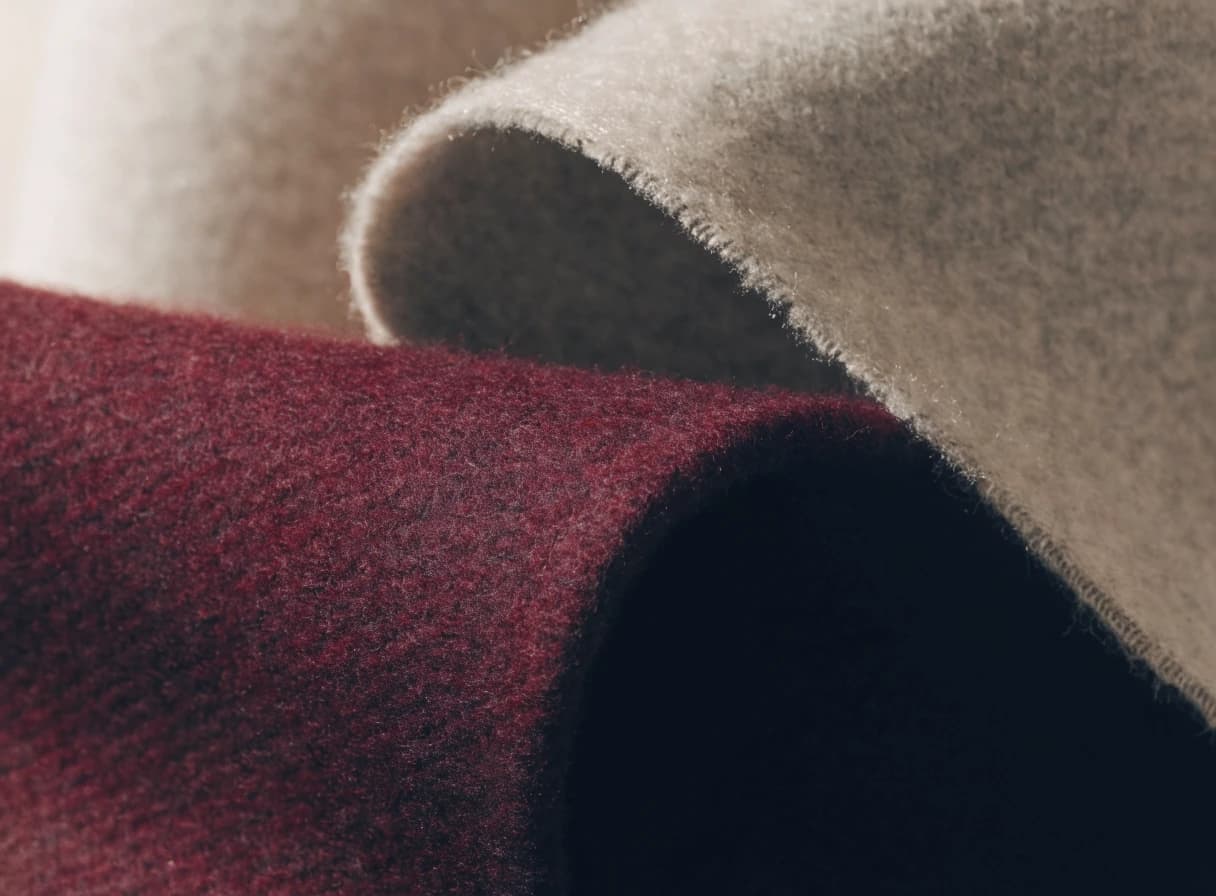Close view of burgundy wool fabric